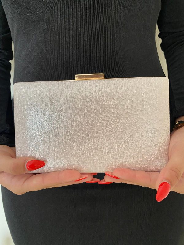 Cartera de mano rosa y dorada - Imagen 3