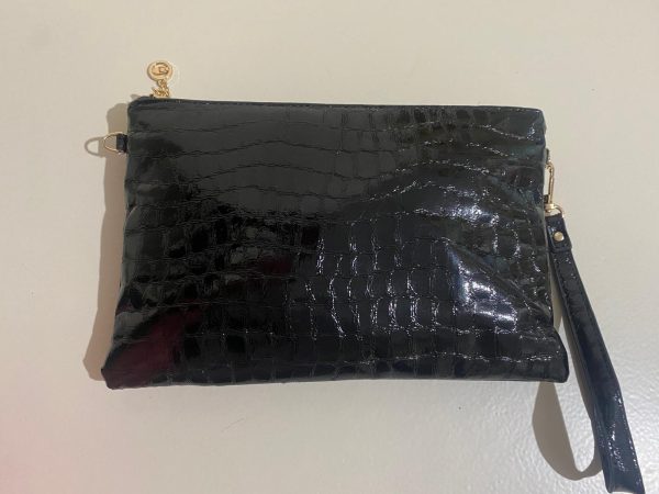 Cartera de mano con reflejos brillantes - Imagen 2