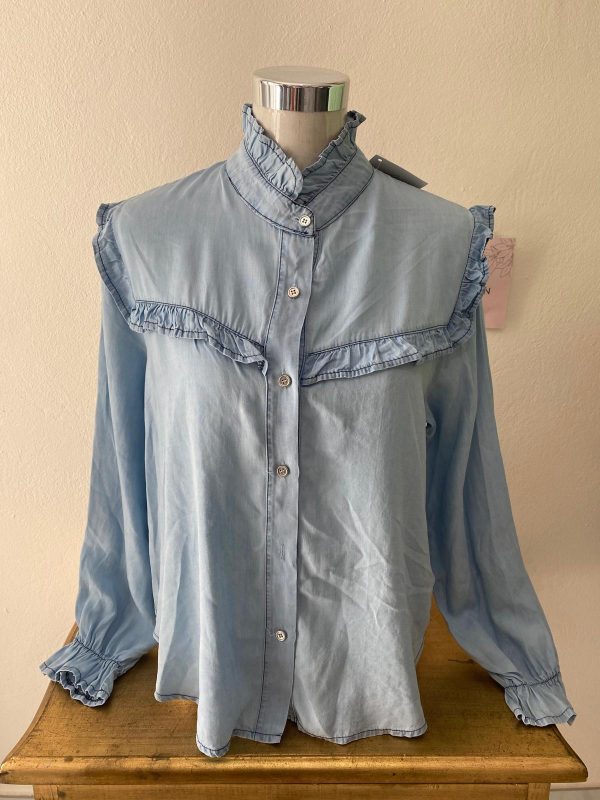 Blusa celeste  estilo vaquera